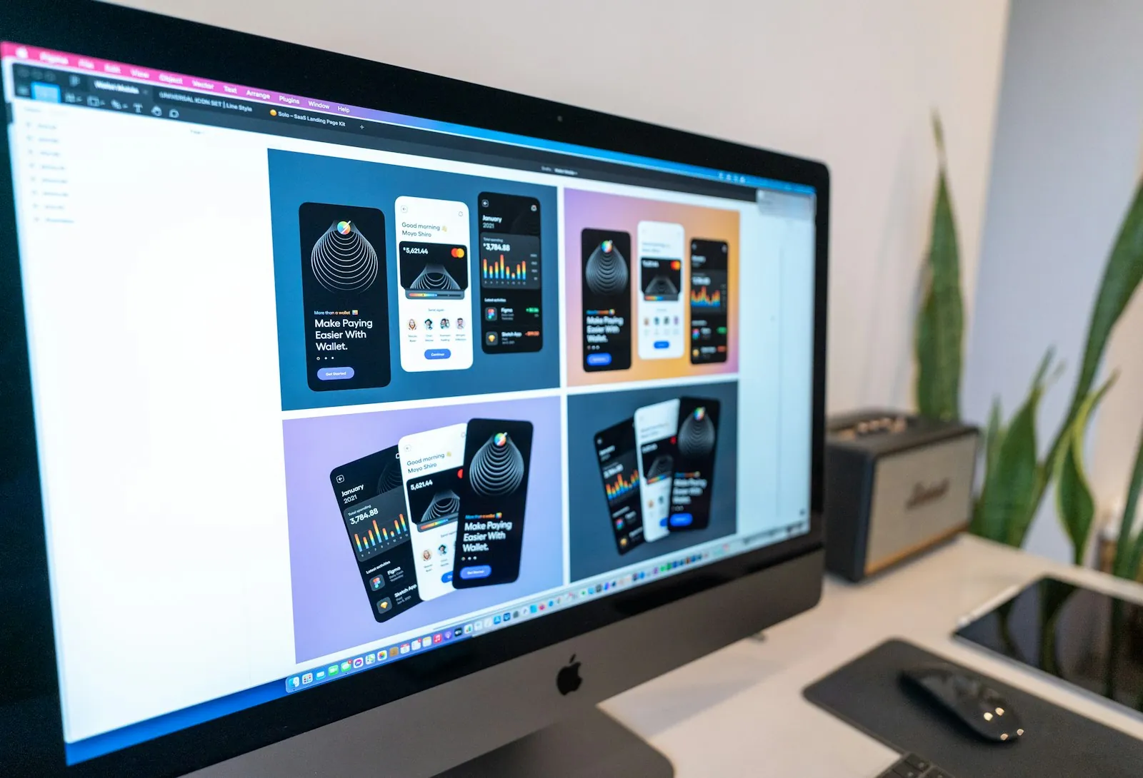 Desktop monitor showing a Figma design file with mobile app screens on the canvas, the starting point for Figma to HTML conversion